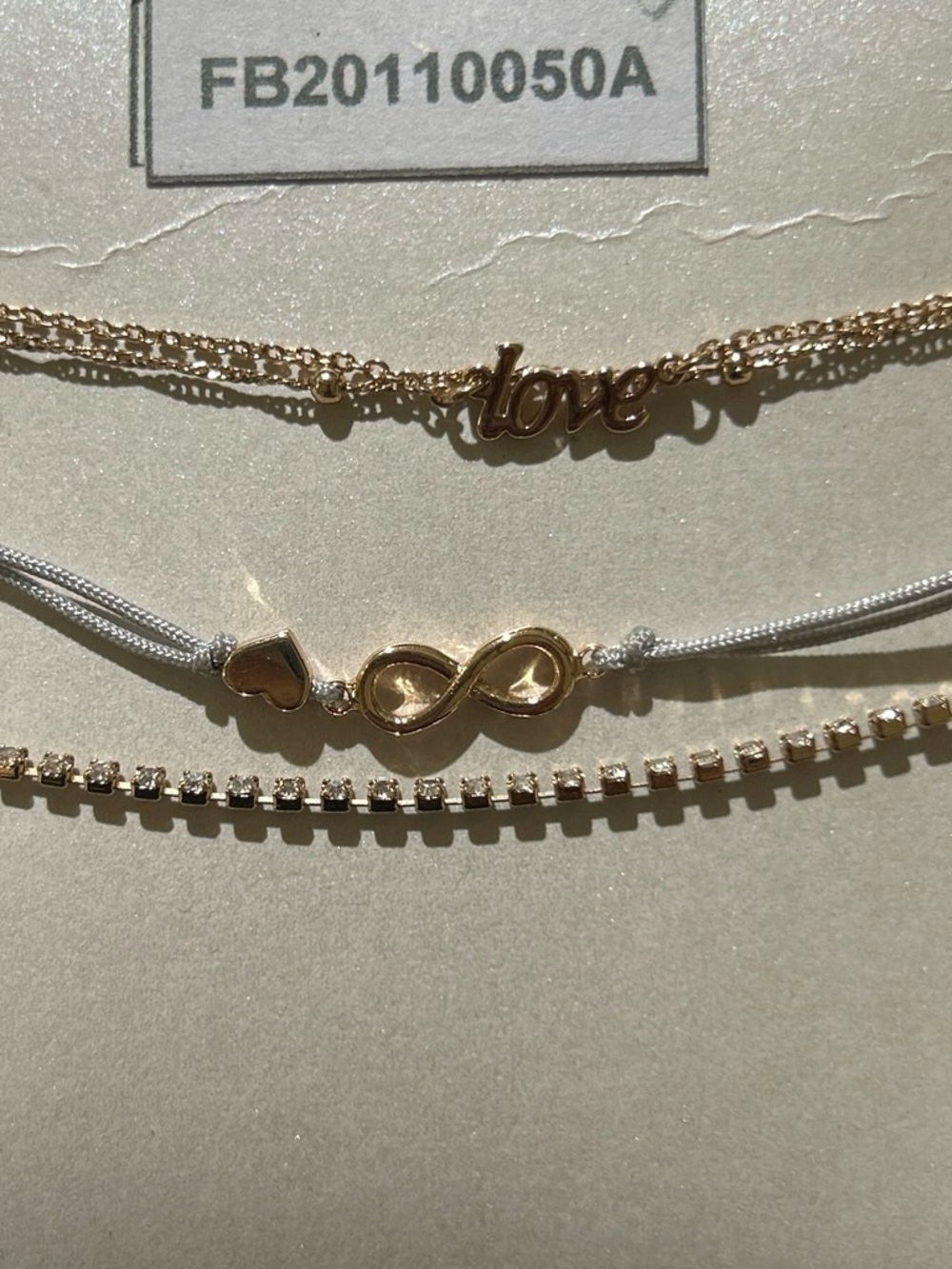 Gold Tone 'Love' and Infinity Layered Bracelet Set